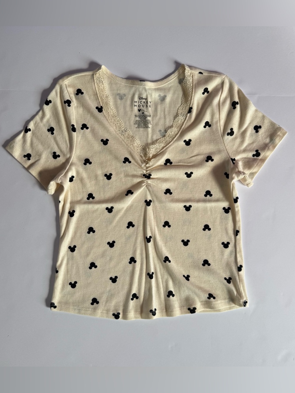 Disney Cream Tee with Black Mickey Silhouettes,Size Medium